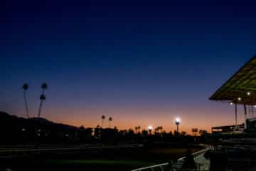 October 29, 2023, Arcadia, CA, USA: The sun rises during morning workouts at Santa Anita Park in Arcadia, California on